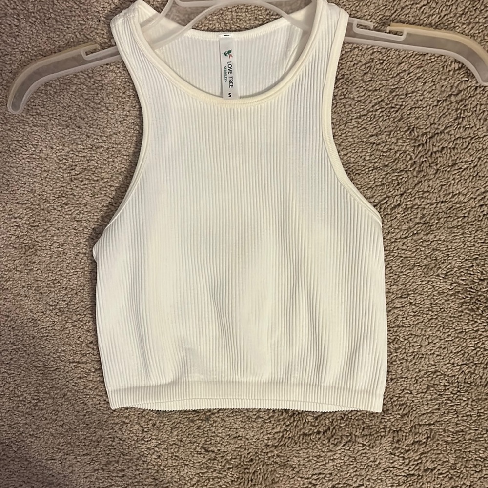 This white lined top from Love Tree is in good condition and never worn
